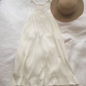 White/cream dress with lace back detailing